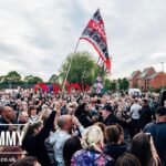Salford Bands Together to Welcome Tommy Robinson