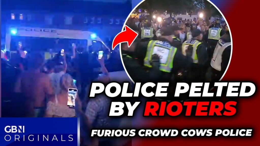 WATCH: Police PELTED by furious RIOTERS as cops LOSE CONTROL of British street